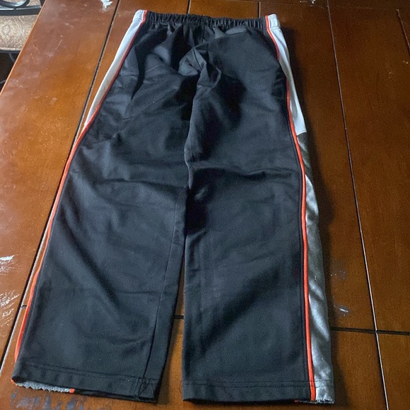 Reebok tricot pants size S (8) boys. Black white and orange/grey. - Picture 10 of 16